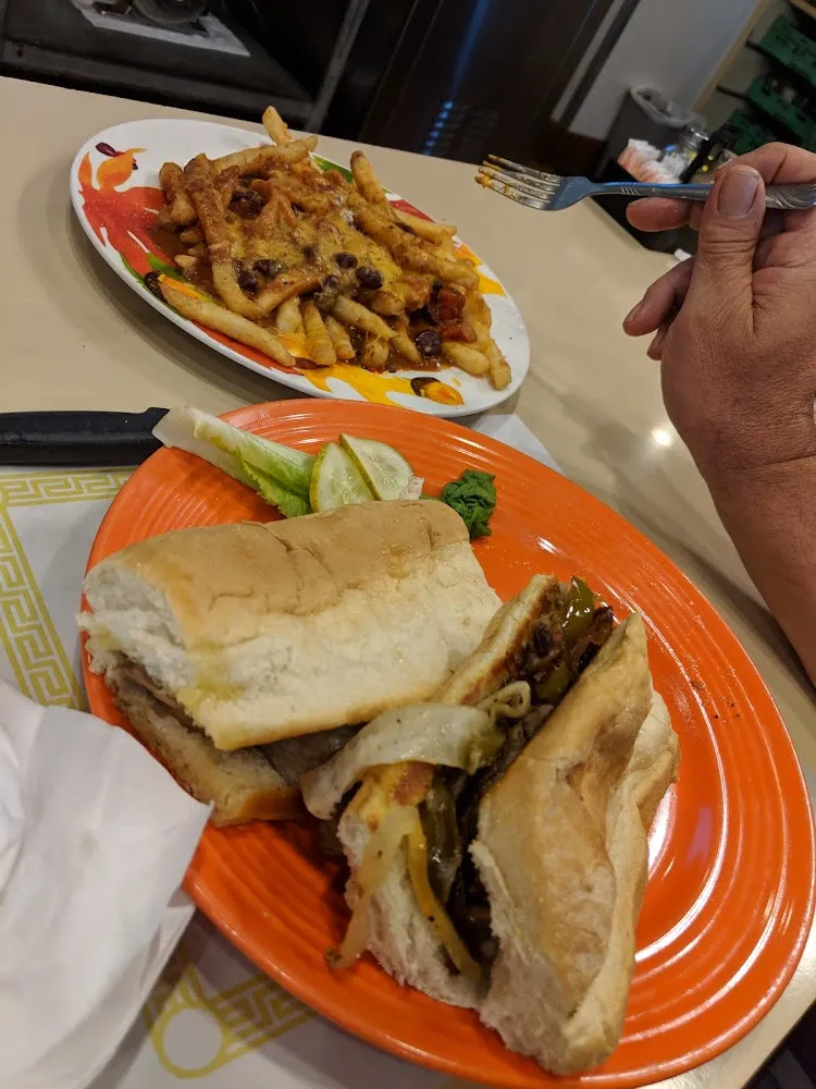 Philly Cheese Steak Sandwich and Chili Cheese Fries